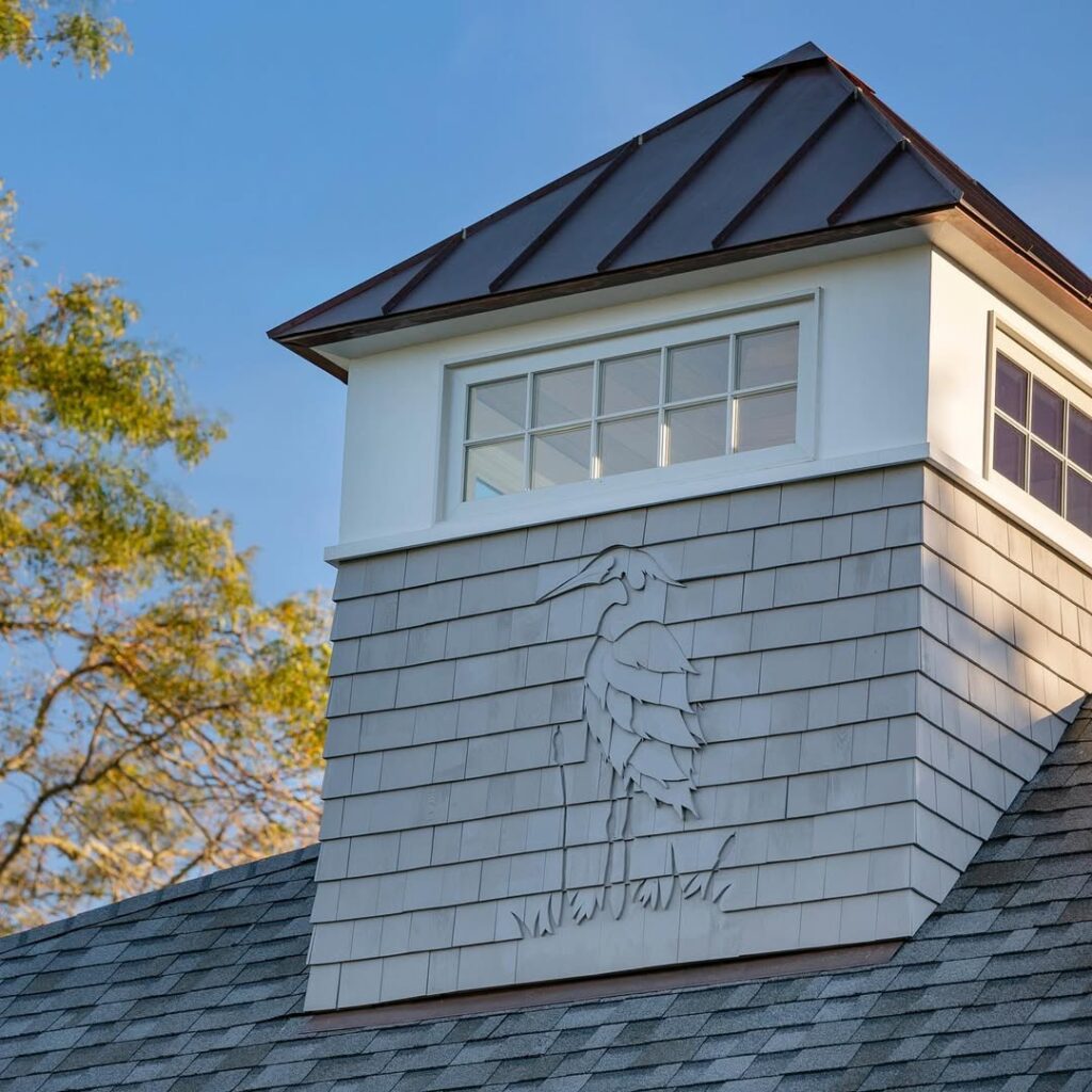 custom cedar siding with layered geometric shingle design