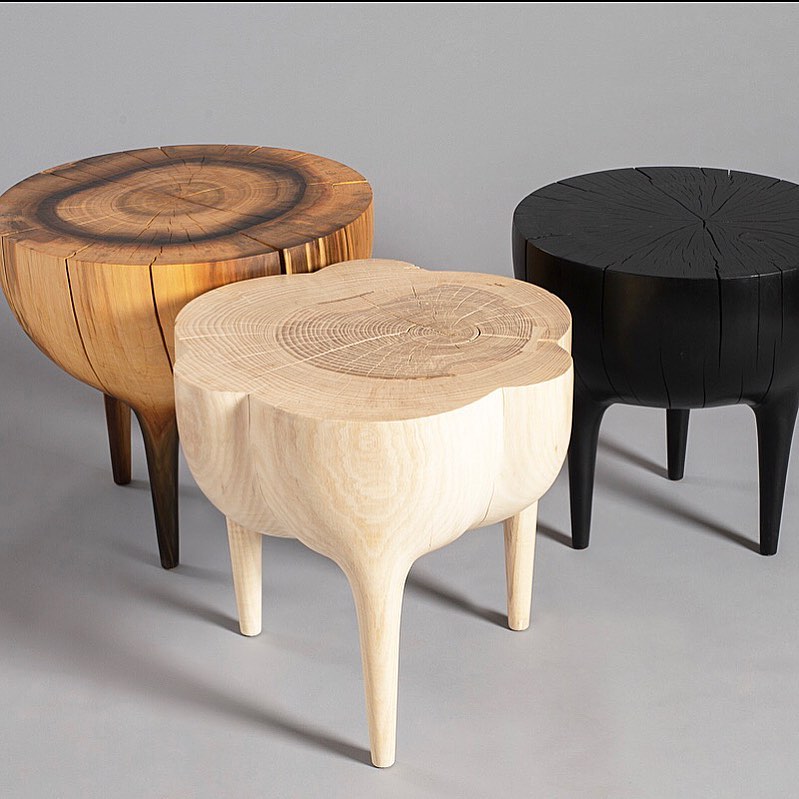 Trio of carved tables