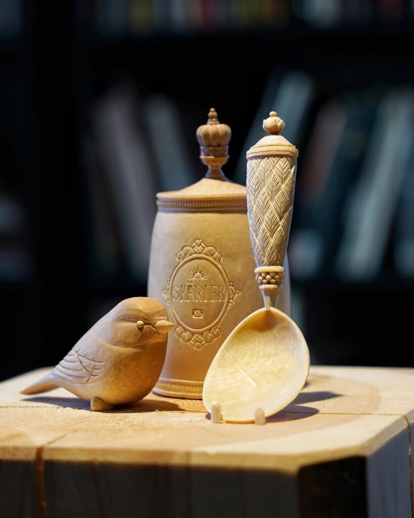 Carved bird, traditional swedish box and spoon