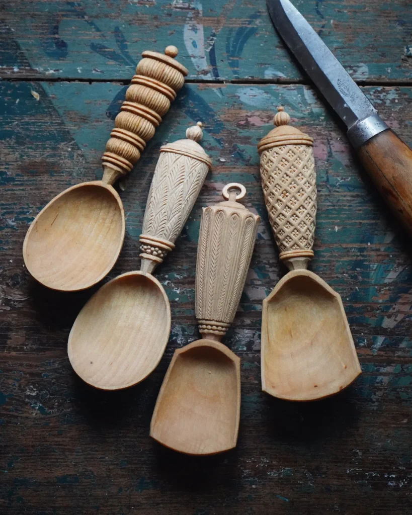 4 different hand carved spoons
