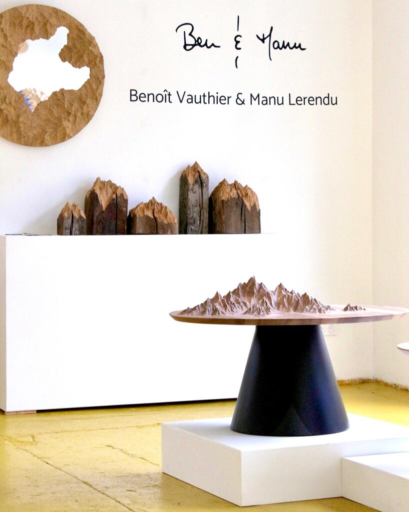 benoit vauthier and manu lerendu carved mountains table, mirror and rustic beams