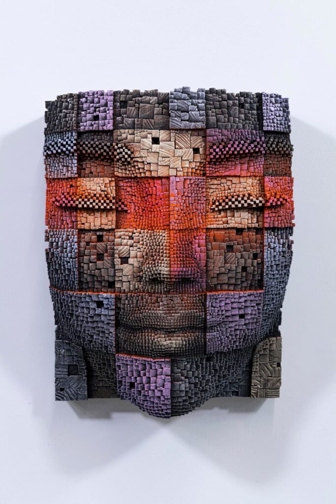 Pixelated face sculpture