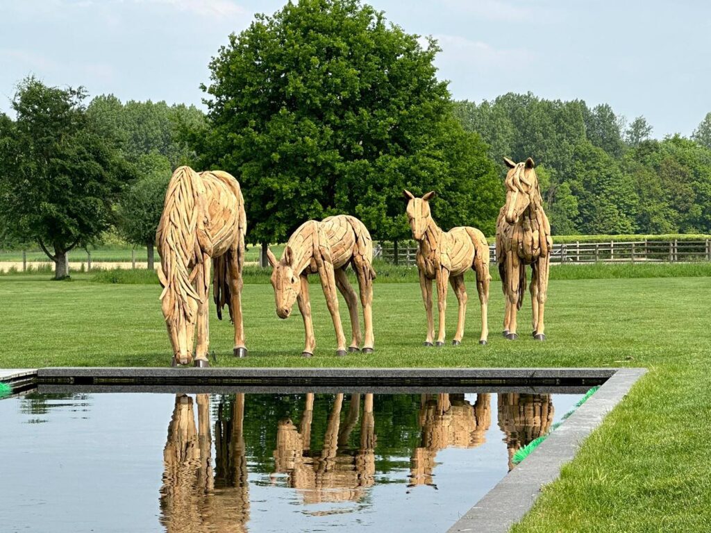 horse family sculptures made from reclaimed wood