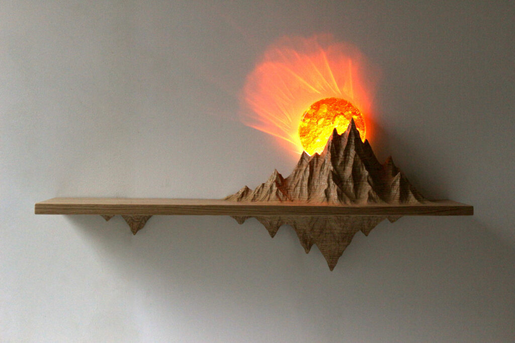 mountains sunset carved shelf