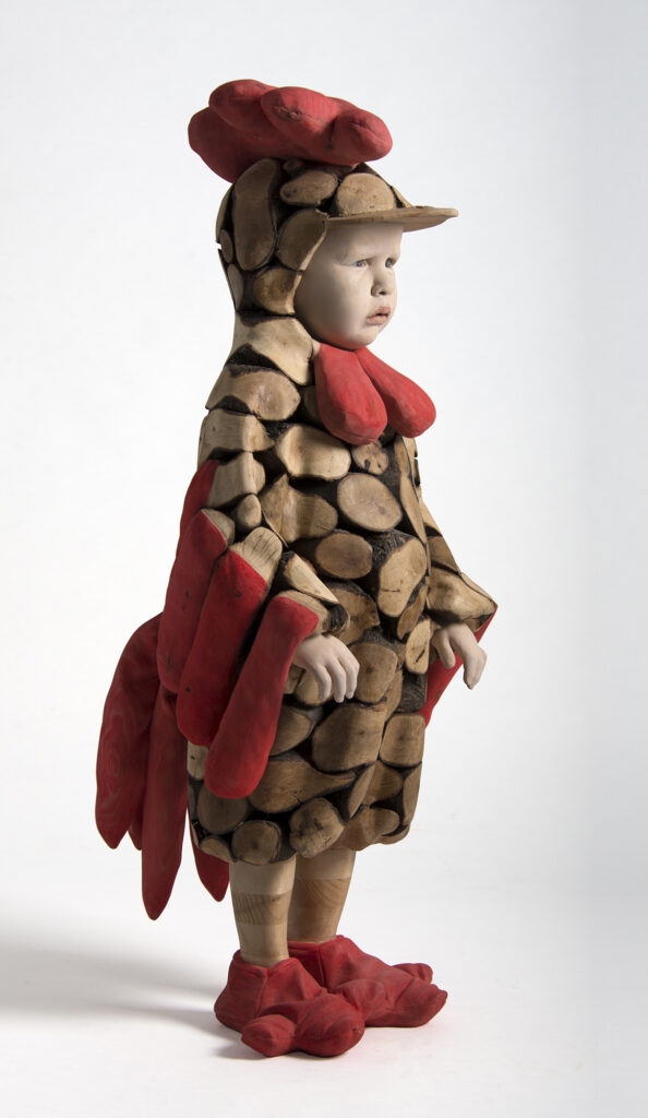 Efraïm Rodríguez children with rooster costume