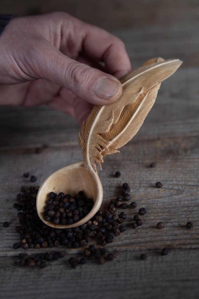 Giles Newman carved spoon in use
