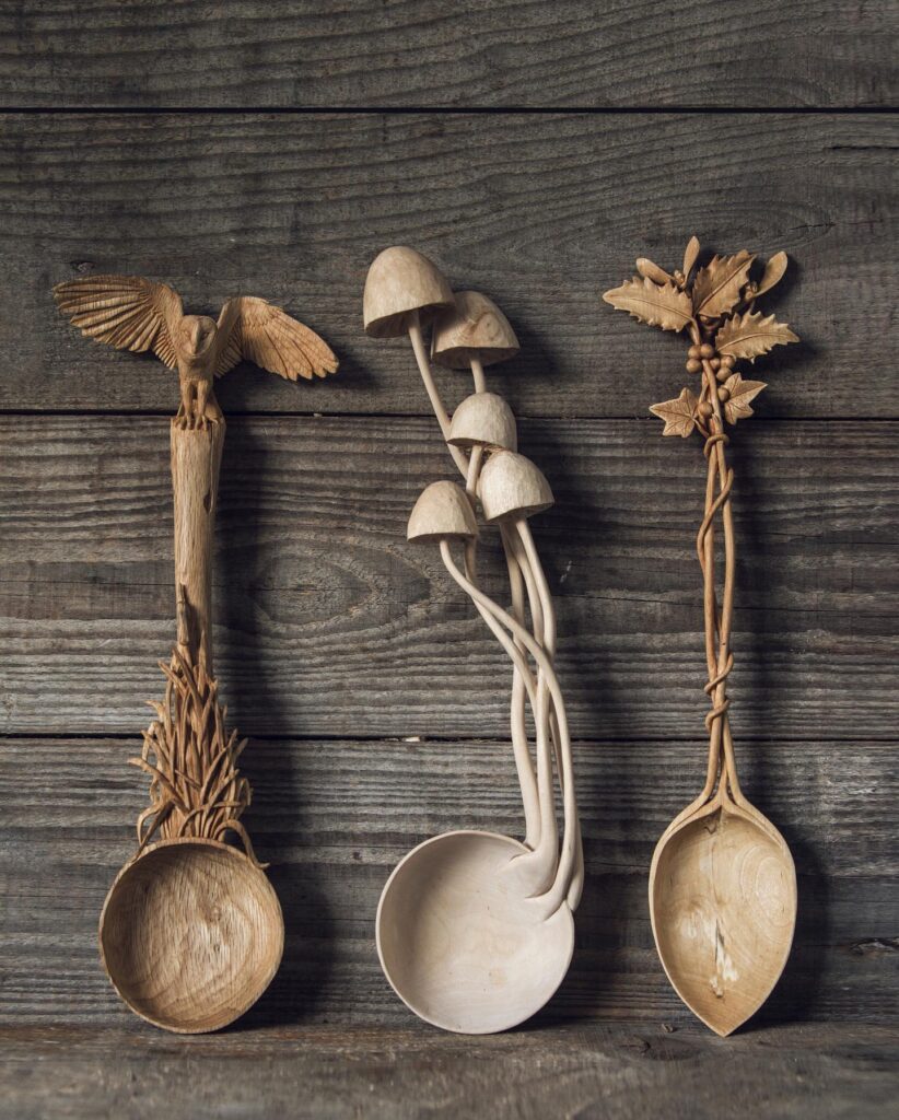 Giles Newman carved spoons trio