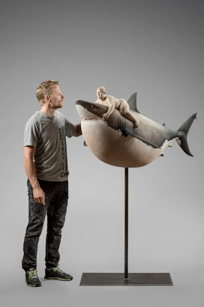 Matthias Verginer with his sculpture
