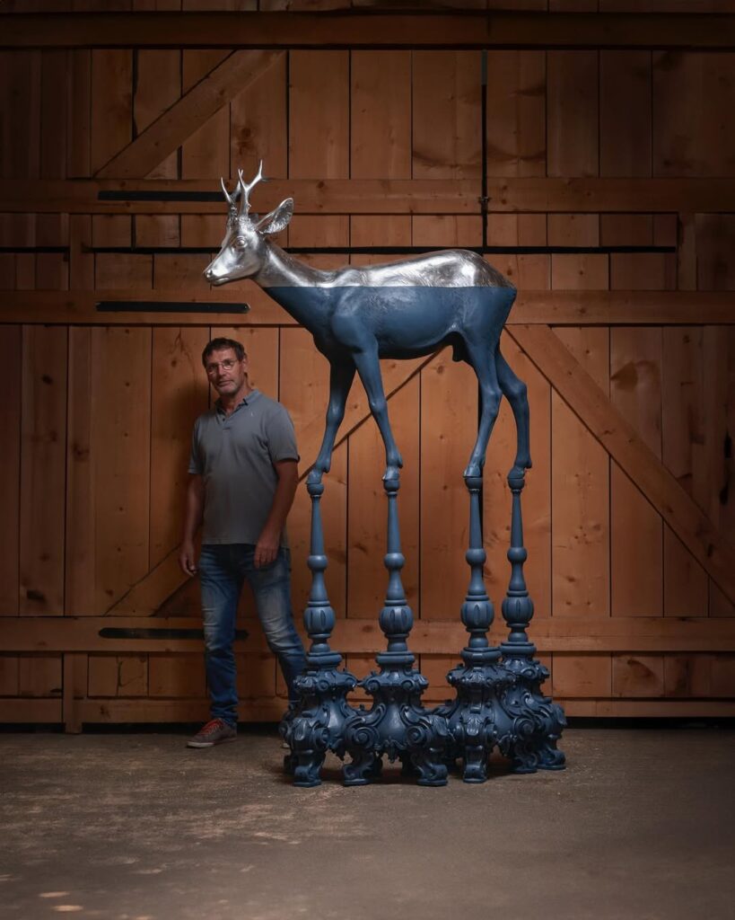 Willy Verginer and his elk sculpture